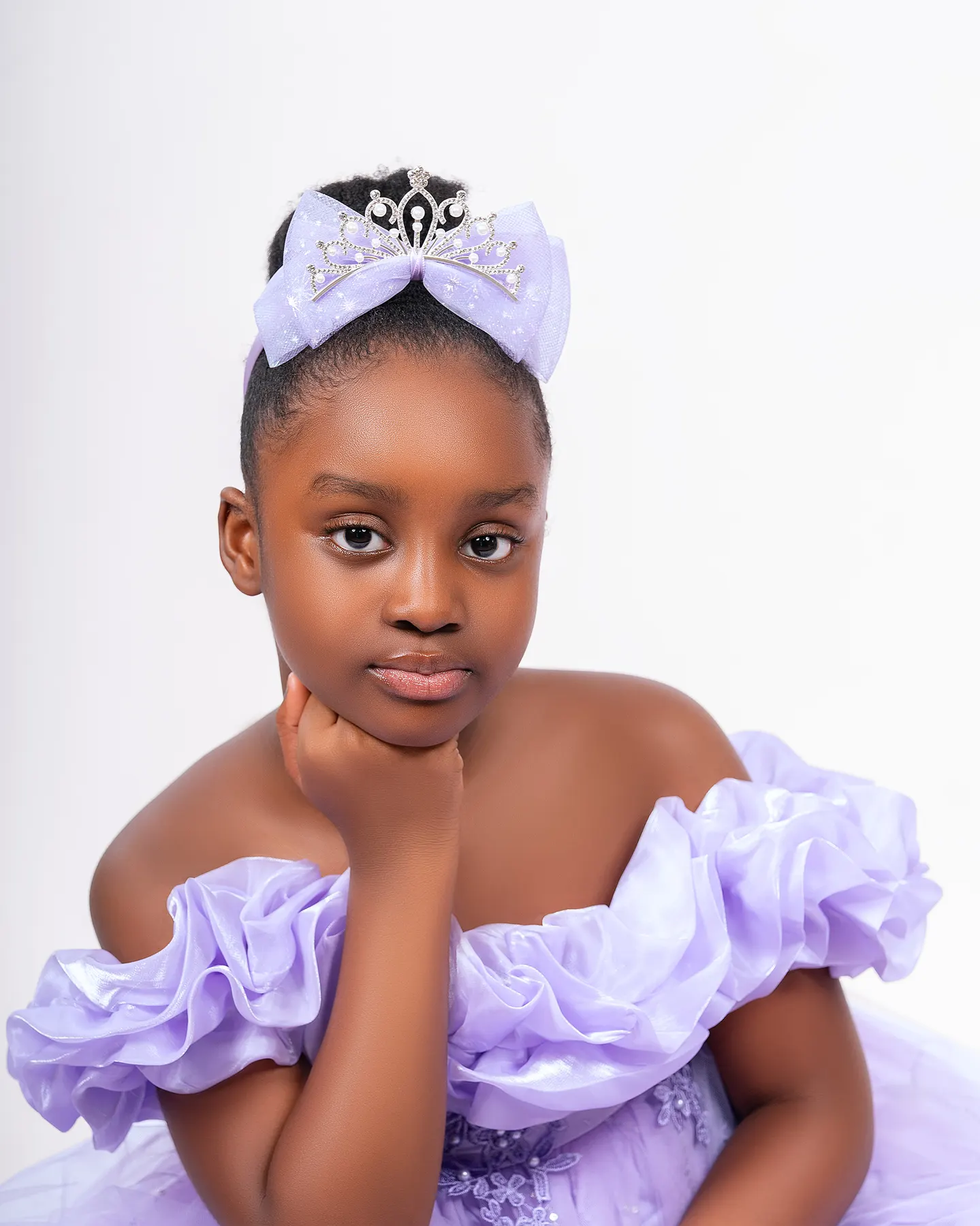 Kids portrait in a princess dress and tiara