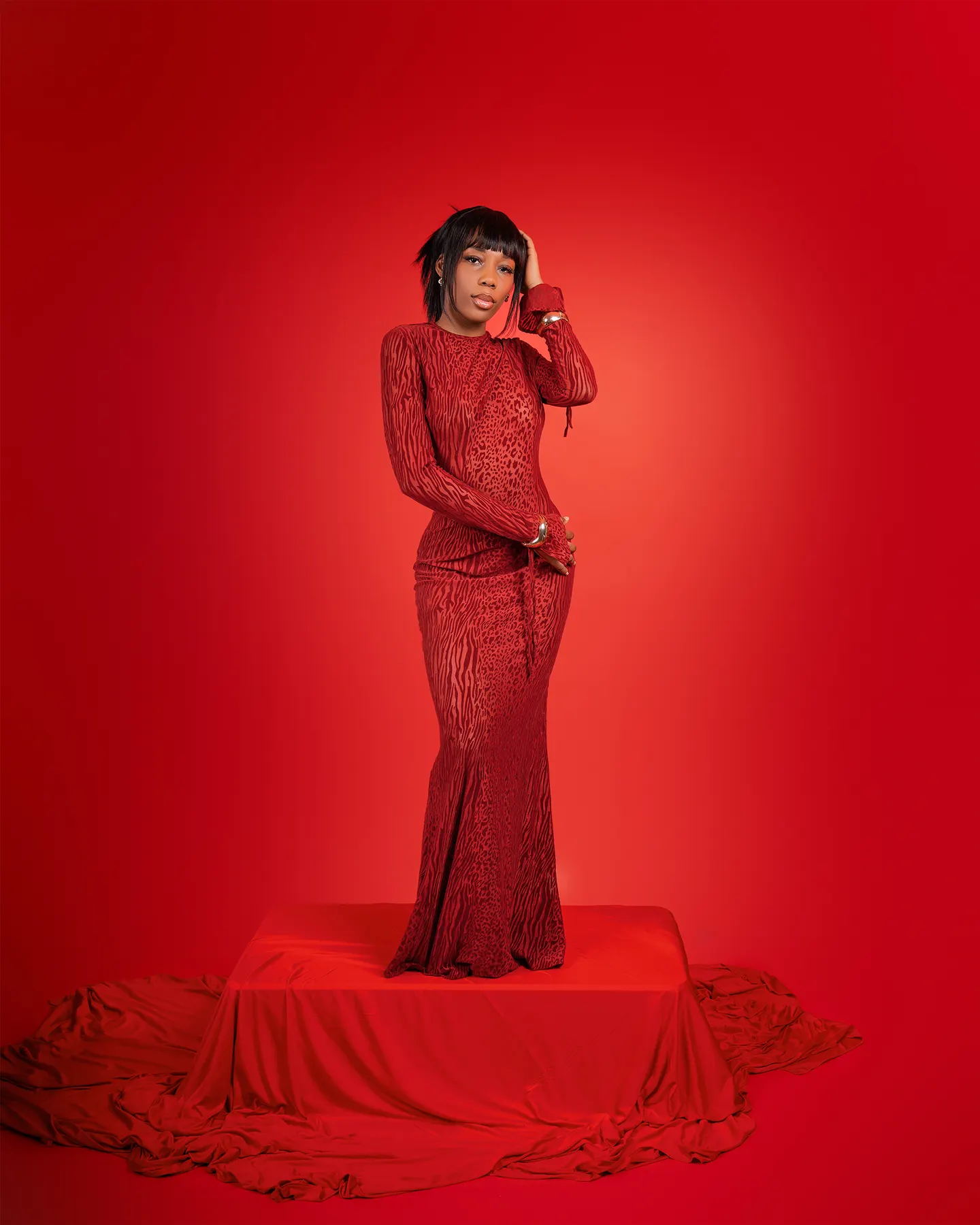 Bold red gown portrait in the Columbus studio